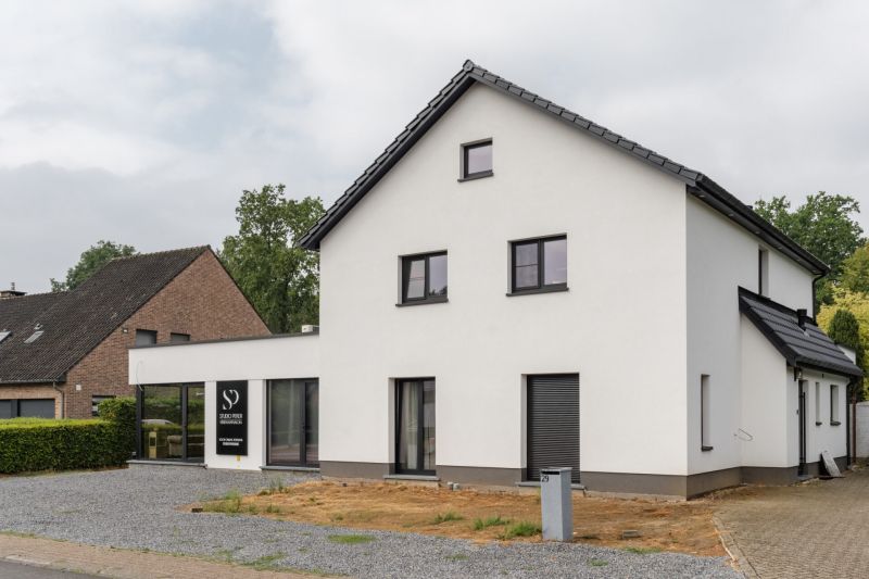 Woning met kapsalon in Houthalen na volledige buitengevelisolatie